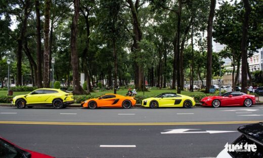 Seamless multi-colored supercars on the road on the occasion of the National Day holiday