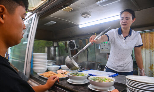 Old coach transformed into pho stall in Hanoi