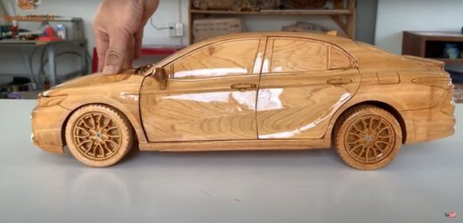 Close-up of extremely sophisticated wooden Toyota Camry by Vietnamese carpenters