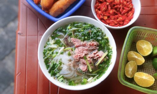 Eaters enjoy train sounds at Hanoi pho joint